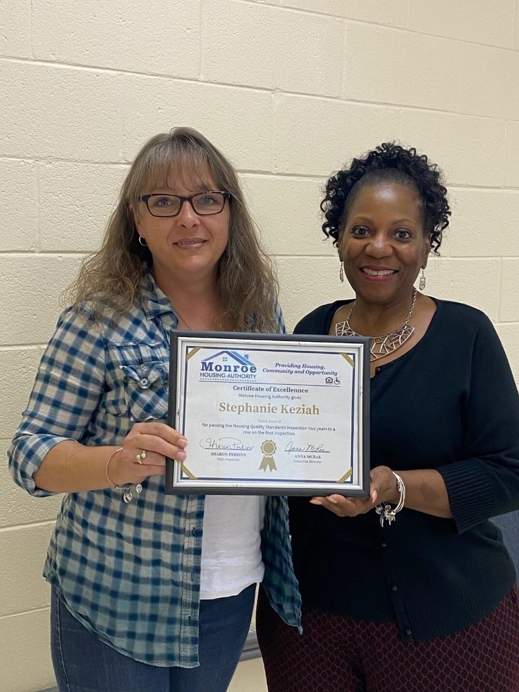 Stephanie Keziah  with gold certificate of excellence
