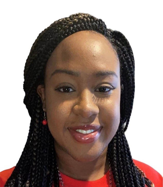 A headshot of a smiling woman. 