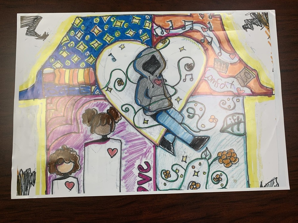 October winning drawing shows a person in a hoodie surrounded by music notes and the things they love about their home.