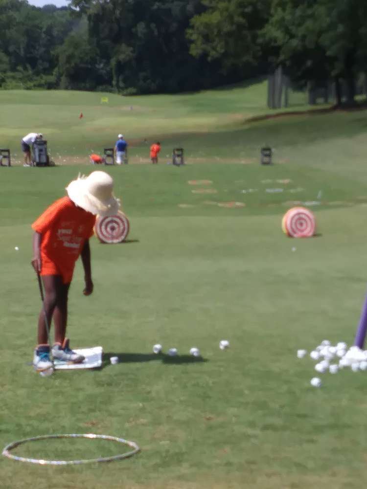 Field trip kids at the driving range