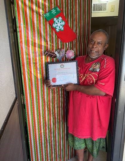 Mr. Hazel Bennet with decorated door