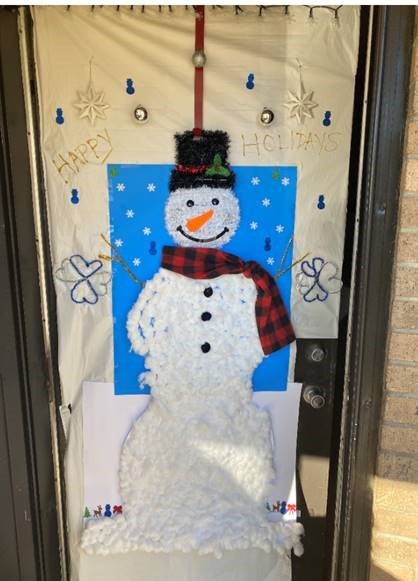 Mr. Tameka Austin with decorated door