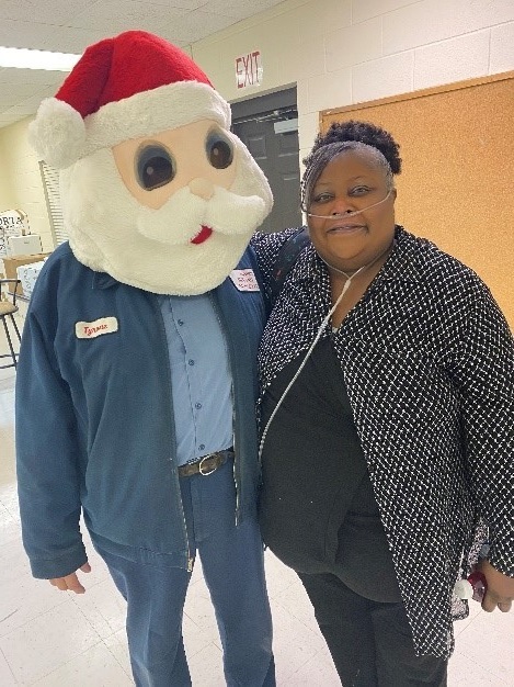 Santa with resident on oxygen tube