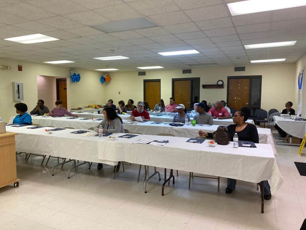 participants seated at tables