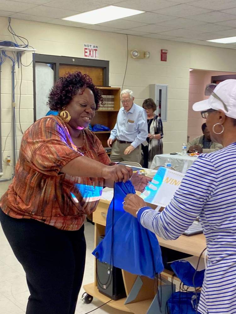 After orientation, handing out goody bags