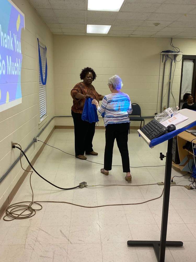 After orientation, handing out thank you bags