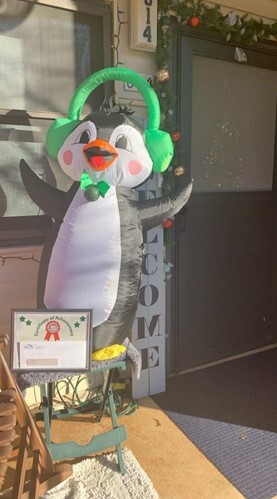 Door with inflatable penguin