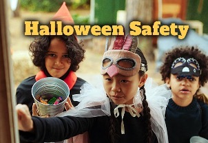 Halloween Safety, three children trick or treating.